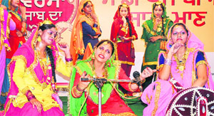 School students perform during the Punjabi Virsa Bachao programme in Jalandhar on Monday. 
