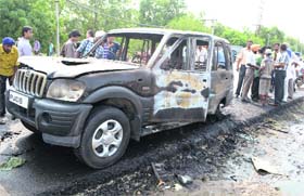 The Scorpio that caught fire on the Dugri Bridge in Ludhiana on Monday