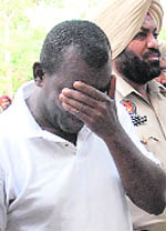 Accused John Mensa