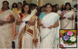 (Inset) The floral decoration for Onam; women take part in the prayer song (right) to mark the celebrations.