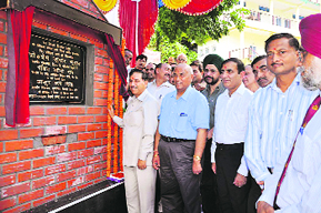 Forest Minister Khimi Ram lays the foundation stone of the administrative block of the Rangers college in Sundernagar on Tuesday.