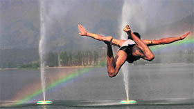 A boy dives into the Dal lake to seek some relief from the soaring temperatures in Srinagar. The city has witnessed a sudden rise in temperature over the past few days.