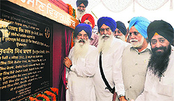 State ministers Sharanjit Singh Dhillon, Janmeja Singh Sekhon and Ajit Singh Kohar inaugurate a bridge at Gidderpindi in Jalandhar