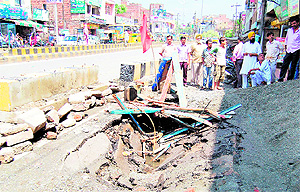 The portion of the road which caved in on Tuesday at Lohgarh area in Amritsar