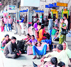 Stranded passengers wait for the rail traffic to resume at Amritsar railway station on Wednesday
