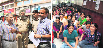 The owner of Dr Khera's Institute (in circle) argues with officials of the Estate Office at Sector 22 in Chandigarh on Wednesday; and (right) students sit on the floor as the institute remained locked from inside. 