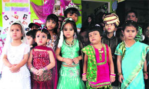 Students of Poly Kids School participate in a fancy dress competition on the occasion of Teachers Day in Dehradun on Wednesday. 