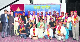 Governor Urmila Singh and Chief Minister PK Dhumal with national and state awardee teachers at a Teachers Day function organised at the Raj Bhawan in Shimla on Wednesday