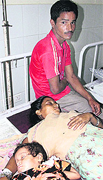 Babita with her husband Satish at the Civil Hospital in Jalandhar on Wednesday