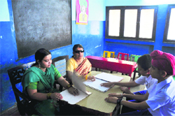 Visually impaired teachers Iqbaljeet Kaur (left) and Maya Mehlawat ( right) teach students at the VRTC in Ludhiana on Wednesday. Tribune Photo: Himanshu Mahajan