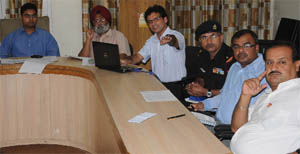 Officials deliberate at a meeting held in connection with the National Nutrition Week on Thursday. 