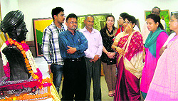 Former Principal of Bhagini Navedita College Sarla Chahal (right) visits the art exhibition organised at Murthal university