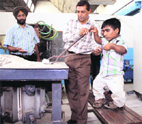 Vikas Kumar with his teachers at Dr B.R. Ambedkar National Institute of Technology in Jalandhar. Photo: Sarabjit Singh