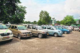 Cabs lined up at a taxi stand at the Tourist Reception Centre in Srinagar