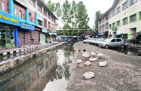 A puddle along a street in the Lal Chowk area of Srinagar on Thursday