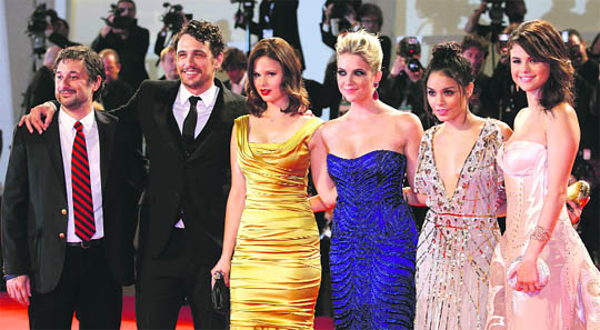 (R to L) U.S. actress Selena Gomez, Vanessa Hudgens, Ashley Benson, Rachel Korine, actor James Franco and director Harmony Korine pose on the red carpet for the movie Spring Breakers during the 69th Venice Film Festival in Venice.