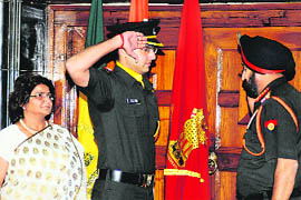 Lieutenant Sachin Pilot salutes Army Chief Gen Bikram Singh as his mother Rama Pilot looks on in New Delhi on Thursday. 