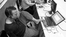 Physically challenged Rashedul Azam demonstrates a hands-free speech recognition software during an exhibition to demonstrate information and communication technology for persons with disabilities in Dhaka on Wednesday. 