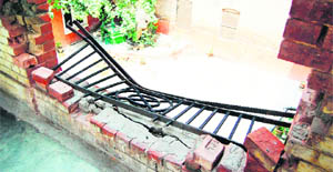 A broken grill at MC-run hospital at Dhab Khatika in Amritsar. 