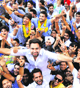 Supporters carry Satinder Singh Satti on their shoulders at the PU in Chandigarh on Friday.