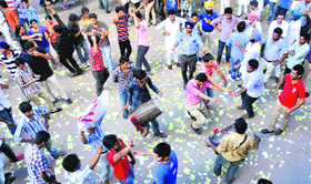 Supporters of the SOPU alliance celebrate their victory in the Panjab University student elections at the student centre in Chandigarh on Friday.