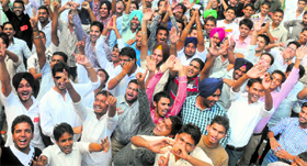 PUSU supporters celebrate their victory at PGGC, Sector 11, in Chandigarh on Friday.