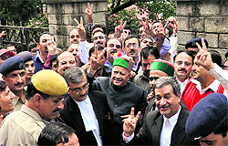Virbhadra Singh comes out of a local court after hearing in Shimla on Friday