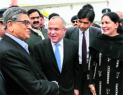 External Affairs Minister SM Krishna is received by Pakistan's High Commissioner to India Salman Bashir on his arrival in Islamabad on Friday