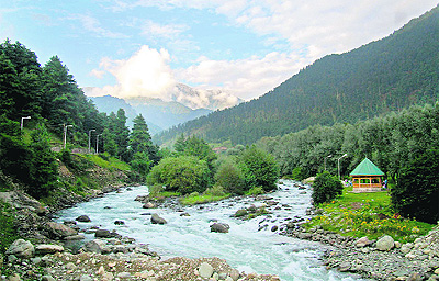 A view of the gushing Lidder river which traverses through the tourist resort of Pahalgam in south Kashmir.