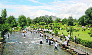 Tourists enjoy at a resort resort in Pahalgam. 