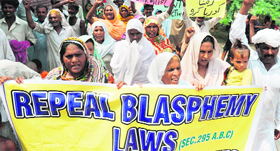 Pakistani Christians march during a protest against the countrys strict blasphemy laws in Korian.