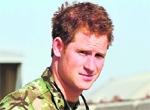Prince Harry gives the thumbs-up upon his arrival at Camp Bastion.