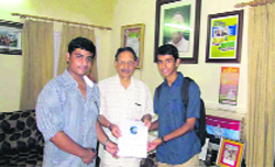 Representatives of Making a Difference present their report on the education status of slum children to former Uttarakhand Chief Minister BC Khanduri in Dehradun on Saturday. 