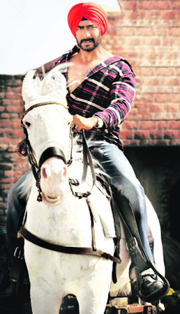 A still from Son of Sardar: Sikhs were offended by a tattoo of Lord Shiva on Ajay Devgns chest.