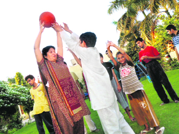 Geeta Kathuria shares a light moment with special children at her NGO in Sirsa.