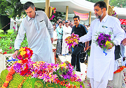 Chief Minister Omar Abdullah pays obeisance at the grave of his grandfather Sheikh Mohmmad Abdullah in Srinagar on Saturday