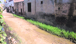 A street in need of repair at Landa village. Photo by writer