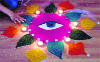 A rangoli made by a student during a thanksgiving ceremony in Ludhiana on Saturday. Photo: Inderjeet Verma