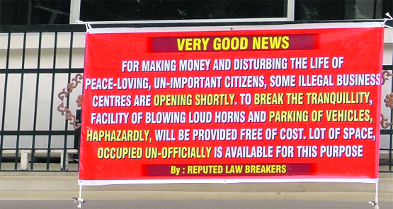 Irked over the illegal commercial activity going on in Sarabha Nagar, a resident has put up a banner outside his house.