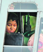 Rimsha Masih, a Christian girl accused of blasphemy, sits in a helicopter after her release from jail in Rawalpindi on Friday