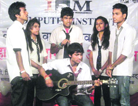 Students of the Institute of Accounts Management perform during their annual day function in Mussoorie on Sunday.