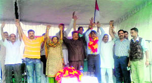 Maheshwar Singh, HLP president, and Dulo Ram, Gaurav Manch president, at the merger ceremony in Palampur on Saturday. 