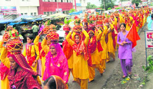 A kalash yatra being taken out through the main market of Kangra on Saturday. 