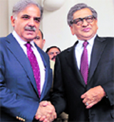Foreign Minister SM Krishna with CM of Punjab province Shahabaz Sharief.