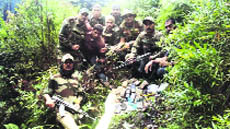 Security forces after busting a hideout in Jaranwala in Rajouri district on Sunday. 