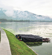 The Dal Lake after rain in Srinagar on Sunday.