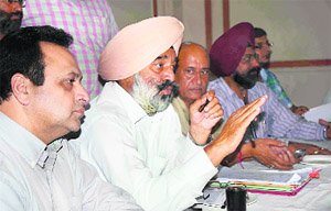 Members of the Punjab Marriage Palace and Resort Association during a press conference in Ludhiana on Sunday