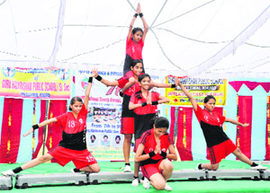 Participants perform at the National Sports Aerobics and Fitness Championship at Phallewal village near Ahmedgarh on Sunday