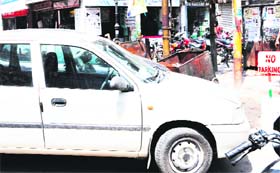 Vehicles parked at no-parking zones at Hall Bazaar in Amritsar