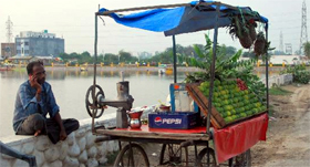 Vendors have set up shop near the lakeside sensing business opportunity as visitors throng the place.